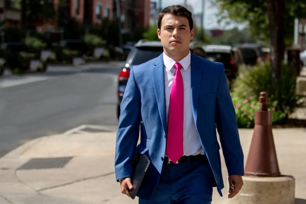 Cesar Ornelas Injury Attorney walking down the street.