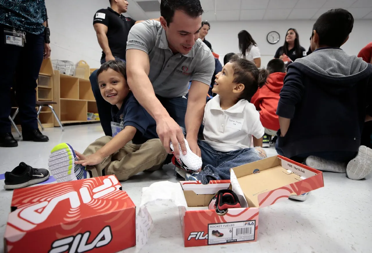 Cesar Ornelas Law at a rotary club shoe giveaway.