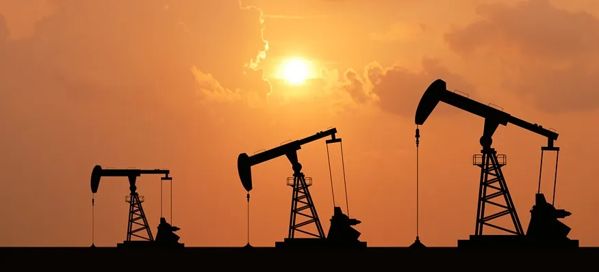 An oilfield during sunset.