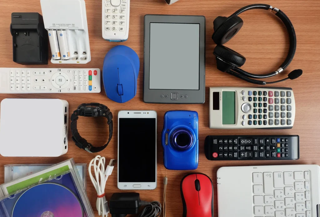 various electronic devices on a table.