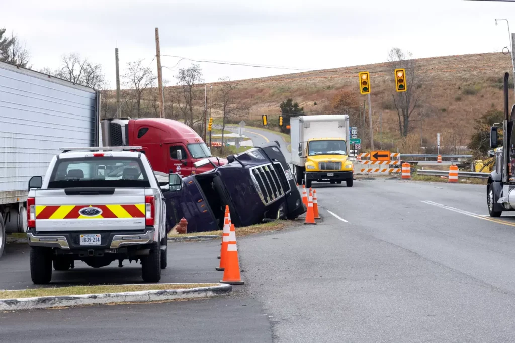A truck collision on the side of the road.